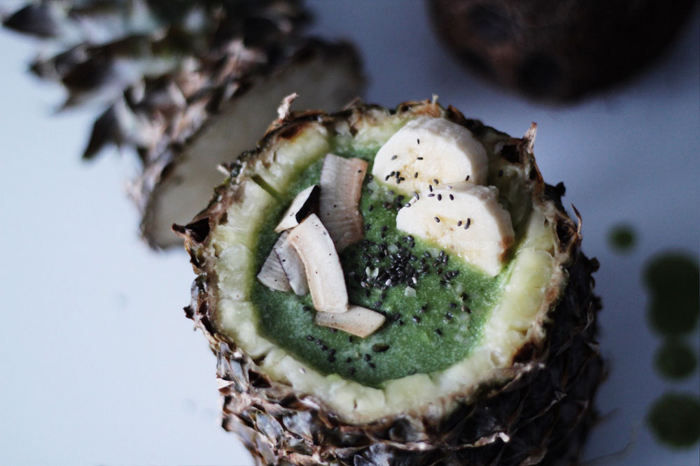 Piña Colada with kale inside a pineapple